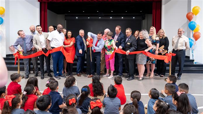  An image of dignitaries during the Galveston Elementary School ribbon cutting ceremony